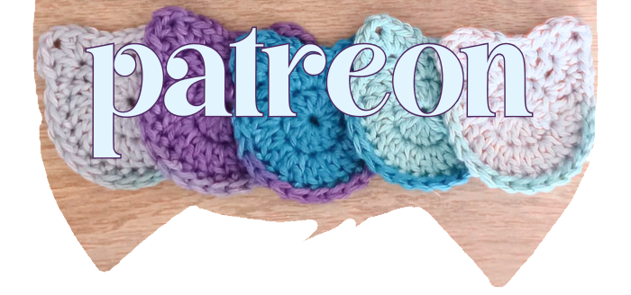 a banner featuring car coasters shaped like cat heads behind the word "patreon".